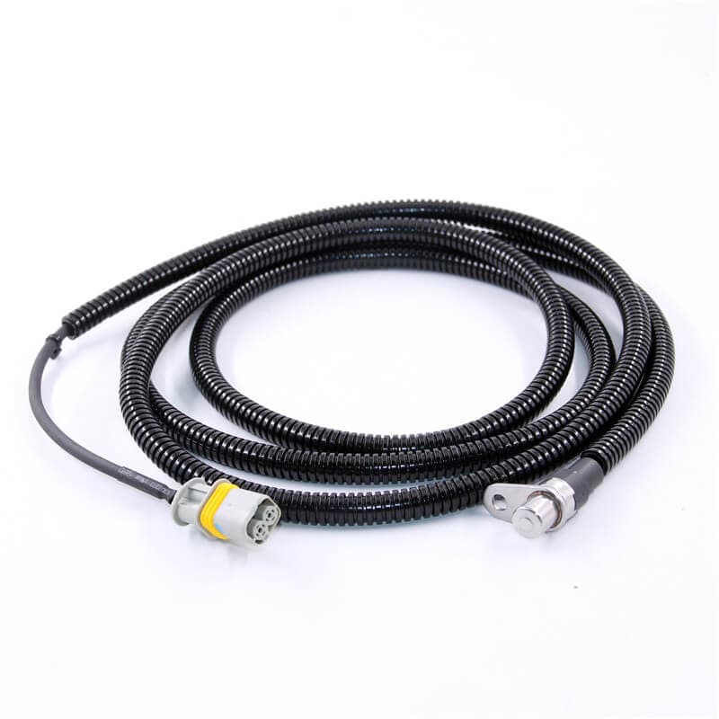 ABS wheel speed sensor with corrugated cable sleeve and connector